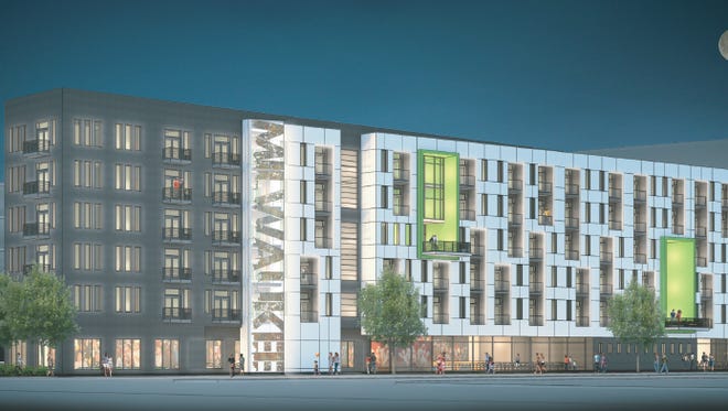 The new Milwaukee Bucks arena's parking structure will include 90 apartments on its upper floors in addition to street-level commercial space.