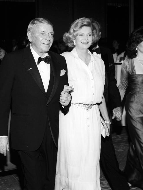 Frank and Barbara Sinatra arrive at a Frank Sinatra Celebrity Invitational Gala in the early 1990s.