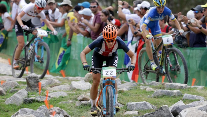 Lea Davison of the United States competes in the women's cross country cycling mountain bike event during the Rio 2016 Summer Olympic Games at Mountain Bike Centre.