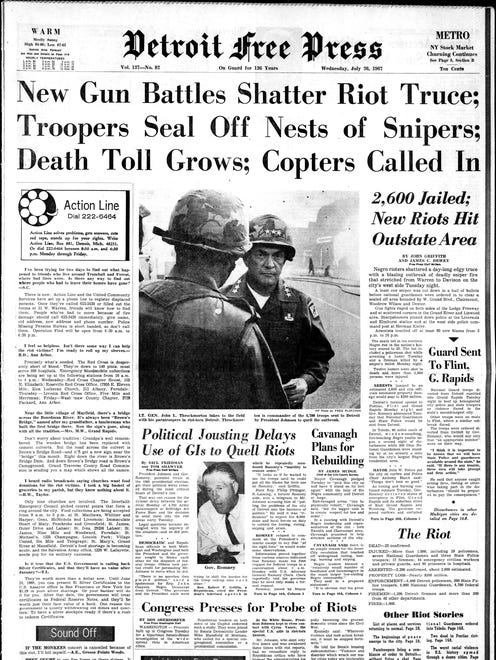 Headline on the page, "New Gun Battles Shatter Riot Truce; Troopers Seal Off Nests of Snipers; Death Toll Grows; Copters Called In." From the Detroit Free Press, July 26, 1967 and the riots in Detroit.
