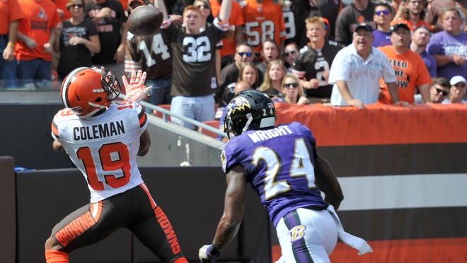 Cleveland Browns wide receiver Corey Coleman (19) catches a touchdown pass as Baltimore Ravens cornerback Shareece Wright (24) defends during the first quarter at FirstEnergy Stadium.
