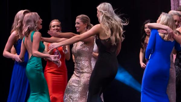 Contestants of the Miss Wisconsin scholarship pageant congratulates the winners of Thursday's preliminary at the Alberta Kimball Auditorium June 15, 2017.