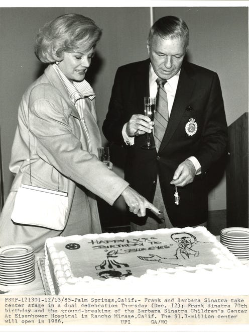 Barbara and Frank Sinatra celebrating the crooner's 70th birthday (Dec. 12) and the ground breaking of the Barbara Sinatra Children's Center at Eisenhower Medical Center in Rancho Mirage. Dec. 13, 1985.
