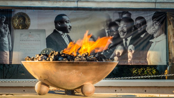 The eternal flame at the Martin Luther King Jr. National Historic Site bears an inscription that says, “The Eternal Flame symbolizes the continuing effort to realize Dr. King’s ideals for the ‘Beloved Community’ which requires lasting commitment that cannot weaken when faced with obstacles.”