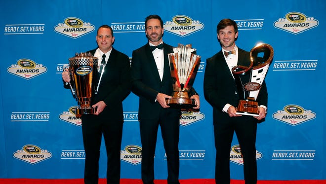 (From left to right) Camping World Truck Series champion Johnny Sauter, Sprint Cup Series champion Jimmie Johnson and XFINITY Series champion Daniel Suarez