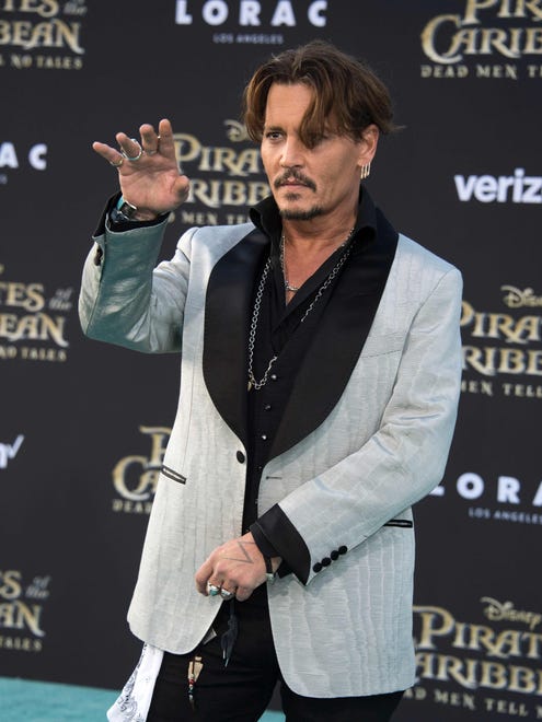 Johnny Depp made sure the premiere of 'Pirates of the Caribbean: Dead Men Tell No Tales' was worthy of his odd character Jack Sparrow at the Dolby Theatre in Hollywood Thursday.