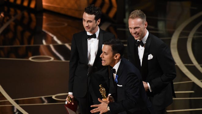 Justin Hurwitz, left, Benj Pasek and Justin Paul accept the award for Best Original  song for 'City Of Stars' from 'La La Land' during the 89th Academy Awards at Dolby Theatre.