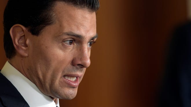 Mexican President Enrique Pena Nieto speaks during a news conference July 22, 2016.