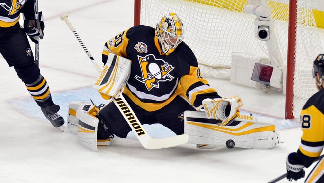 Pittsburgh Penguins goalie Matt Murray (30) makes a save on a shot from Ottawa Senators left wing Clarke MacArthur (not pictured) during the first period in Game 7 of the Eastern Conference final.