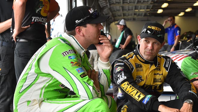 Kyle Busch, left, and Matt Kenseth are two of the four Joe Gibbs Racing teammates that advanced to the third round of the Chase for the Sprint Cup.