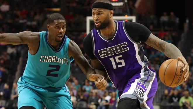 Sacramento Kings forward DeMarcus Cousins (15) drives to the basket against Charlotte Hornets forward Marvin Williams (2) during the matchup at the Spectrum Center.