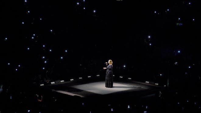 Adele performs during the final concert of her North American tour at Talking Stick Resort Arena on Nov. 21, 2016, in Phoenix.