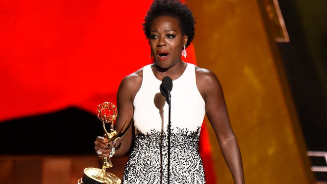 Viola Davis accepts the award for outstanding lead actress in a drama series for 'How to Get Away With Murder' at the 67th Primetime Emmy Awards on Sept. 20, 2015, at the Microsoft Theater in Los Angeles.