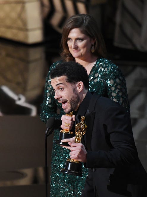 Caroline Waterlow and Ezra Edelman accept the award for Best documentary feature 'O.J.: Made in America'  during the 89th Academy Awards.