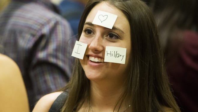 Mollie Rubin, 19, shows her support before an Arizona Democratic Party Early Vote Rally with Chelsea Clinton at Arizona State University in Tempe on Oct. 19, 2016.