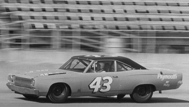 Richard Petty drives his 1968 Plymouth Road Runner around Daytona International Speedway on Feb. 8, 1968 at an average speed of 186.346 mph.  At the time, it was the fastest lap ever clocked over the 2.5 mile oval track.