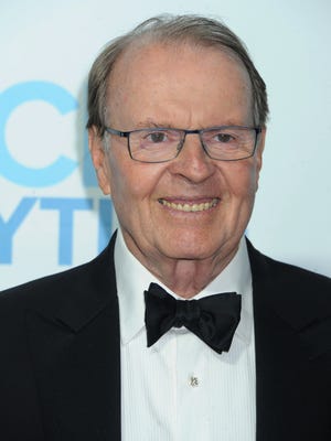 In this June 22, 2014, file photo, Charles Osgood arrives at the Daytime Emmy Awards Afterparty at The Beverly Hilton in Beverly Hills, Calif.