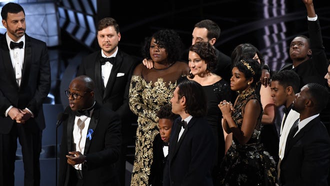 Barry Jenkins speaks on stage as he accepts the Oscar for Best Picture for 'Moonlight' during the 89th Academy Awards.