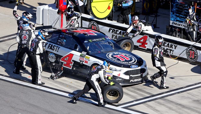 Kevin Harvick (4) making a pit stop, won the second stage of the race.