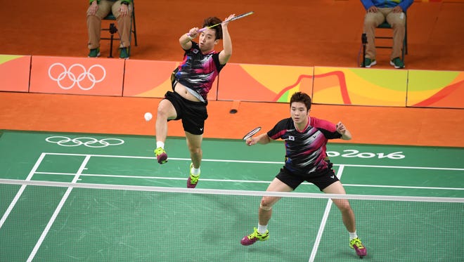 Gi Jung Kim and Sa Rang Kim of South Korea face Marcus Ellis and Chris Langridge of Great Britain during the preliminary round in the Rio 2016 Summer Olympic Games at Riocentro - Pavilion 4.