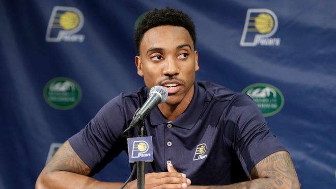 Jeff Teague responds to a question during an NBA basketball news conference Monday, July 11, 2016, in Indianapolis.