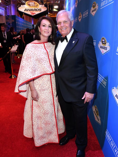 Team owner Rick Hendrick, right, and his wife Linda