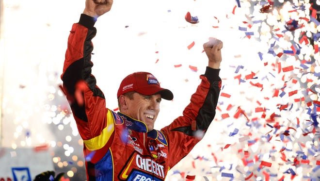 Edwards celebrates in victory lane after winning the Food City 500 at Bristol Motor Speedway on March 16, 2014.