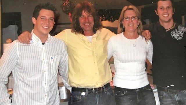 Nolan Webster (right) died at age 22 in the pool at the Grand Oasis in 2007. He's seen here with his family, including brother Ryan (far left) mother Maureen Webster and father, William.