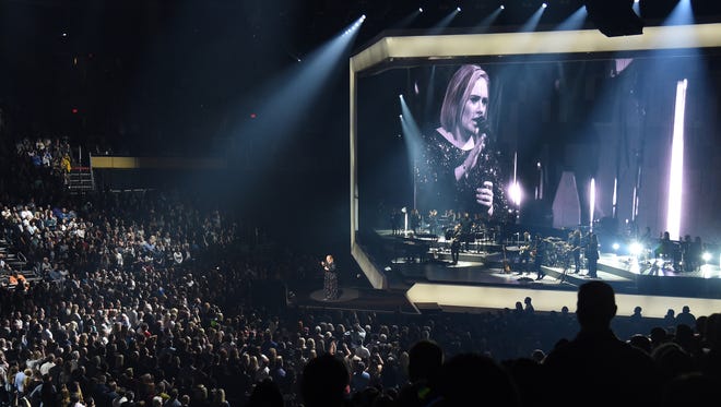 PHOENIX, AZ - NOVEMBER 21:  Adele performs during the final concert of her North American tour at Talking Stick Resort Arena on Nov. 21, 2016 in Phoenix.