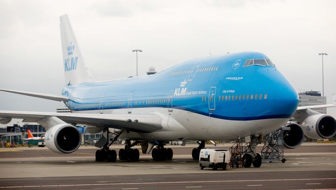 A KLM Boeing 747-400 in new paint rests at Amsterdam's Schiphol Airport on May 29, 2015.