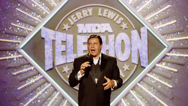 Entertainer Jerry Lewis makes his opening remarks at the 25th Anniversary of the Jerry Lewis MDA Labor Day Telethon fundraiser in Los Angeles on Sept. 2, 1990.