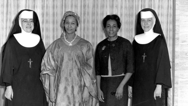 Sierra Leone visitors to Alverno College June 5-6, 1964. Pictured left to right are:  S. J. Dolores Brunner, Olivette Stuart Caulker, Lettie Stuart, and S. Joel Read.