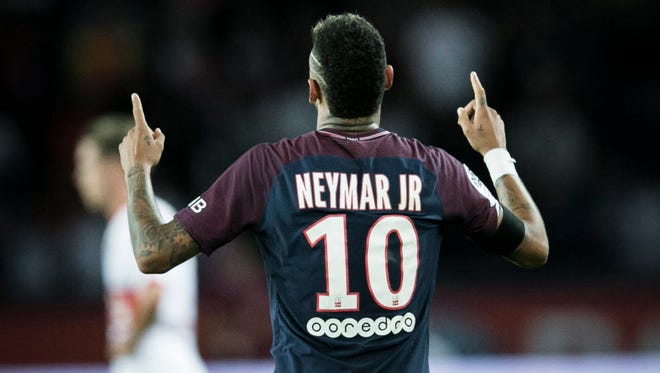 Neymar celebrates after scoring against Toulouse at the Parc des Princes stadium in Paris.