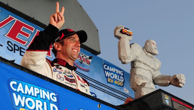 Greg Biffle celebrates in victory lane after winning the Camping World RV 400 at Dover International Speedway in 2008.