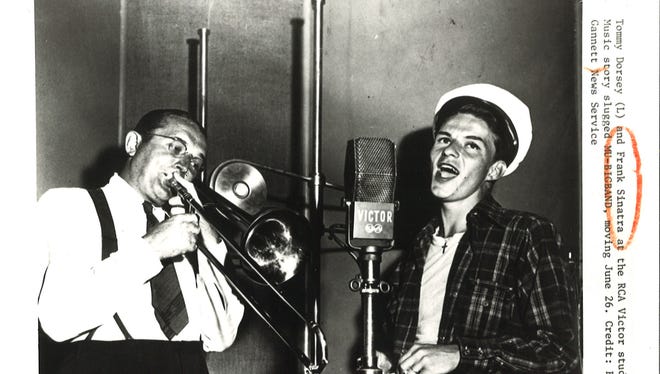 Tommy Dorsey (L) and Frank Sinatra at the RCA Victor Studios in 1941.