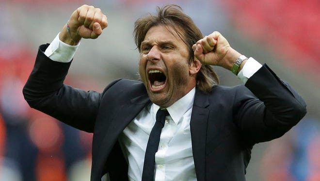 Chelsea's head coach Antonio Conte celebrates victory after the Premier League football match against Tottenham Hotspur  at Wembley Stadium.