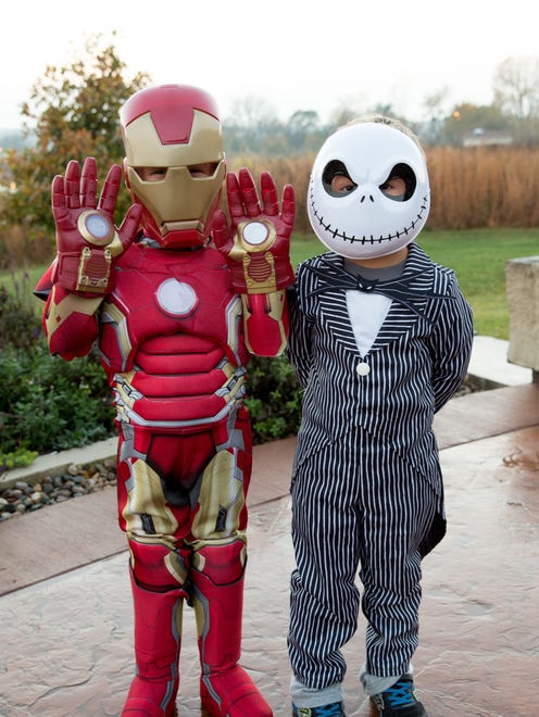 Sean Dickey, 5, (left) and Sebastian Sousek, 4, of West Des Moines, Friday, Oct. 23, 2015, during Halloween Hoopla at Raccoon River Park in West Des Moines.