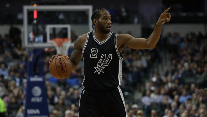 Kawhi Leonard of the San Antonio Spurs during a game against the Dallas Mavericks at American Airlines Center on November 30, 2016.