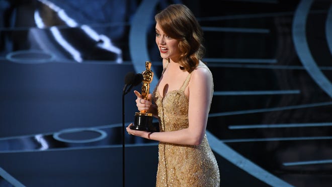 Emma Stone accepts the Oscar for Best Actress for her role in 'La La Land' during the 89th Academy Awards.