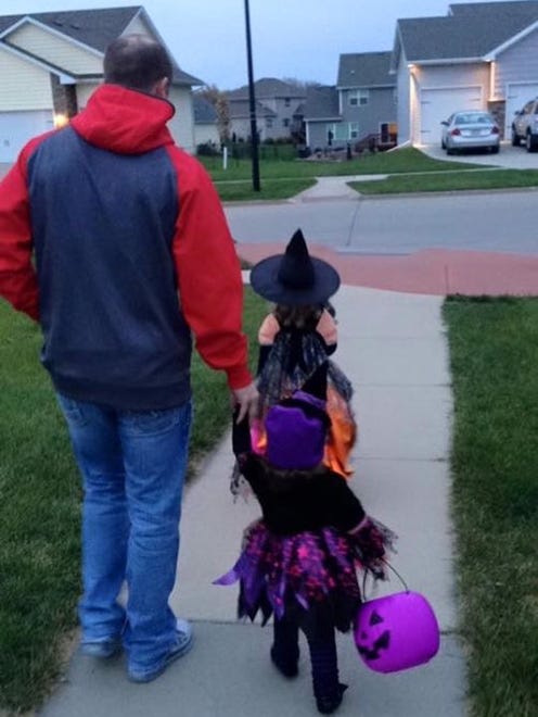 Little witches Brynn Mitchell, 4, and Paige Mitchell, 1, of Ankeny.