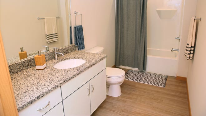 A bathroom inside a terrace studio apartment at the Rhythm apartments, 1640 N. Water St.  The building has 140 units.