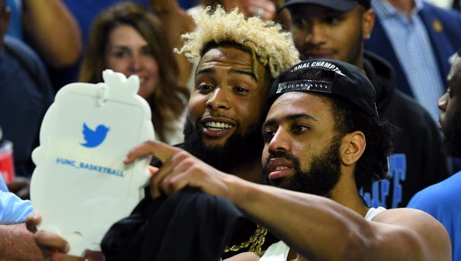North Carolina guard Joel Berry II (2) takes a selfie with New York Giants wide receiver Odell Beckham Jr. after beating Gonzaga for the national title.