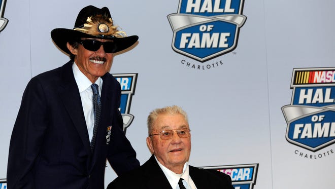 Richard Petty, left, escorts his brother to the 2014 NASCAR Hall of Fame induction ceremony. Maurice Petty was in inducted in the class of 2014; Richard was in the Hall of Fame's first class in  2010.