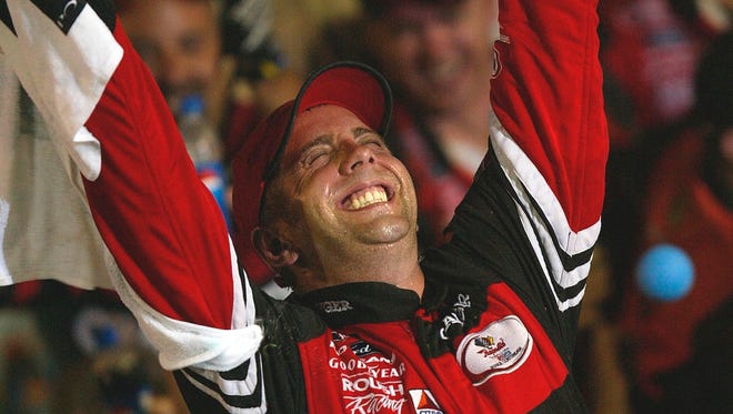 Greg Biffle celebrates in Victory Lane after winning the NASCAR Pepsi 400 in 2003, his first career Sprint Cup win.