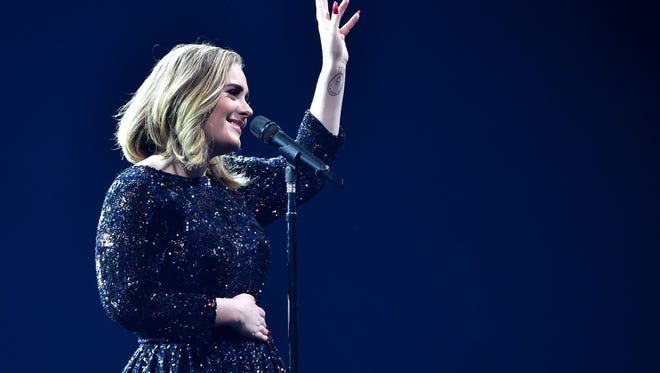 Adele performs on stage at the O2 Arena on March 15, 2016, in London, England.