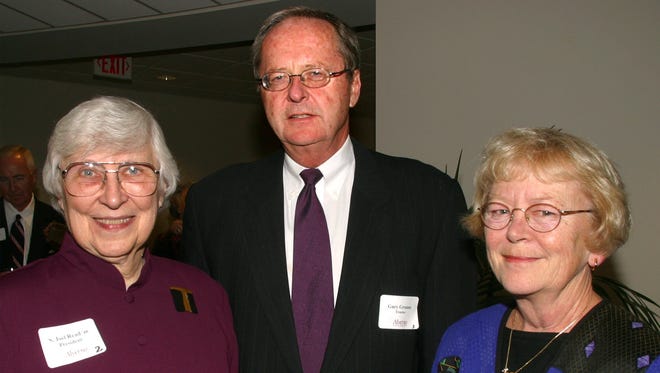 Sister Joel Read, left, Gary Grunau, center, and Jan Martin, left, at a gala closing of Alverno College's recent capital campaign held in the college's Technology Conference Center Tuesday, Oct. 15, 2002, in Milwaukee.