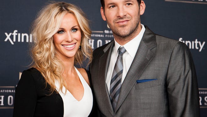Romo and his wife walk the red carpet together before the 4th Annual National Football League Honors in 2015.