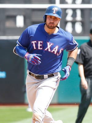 Joey Gallo runs the bases after hitting a solo home run against the Athletics.