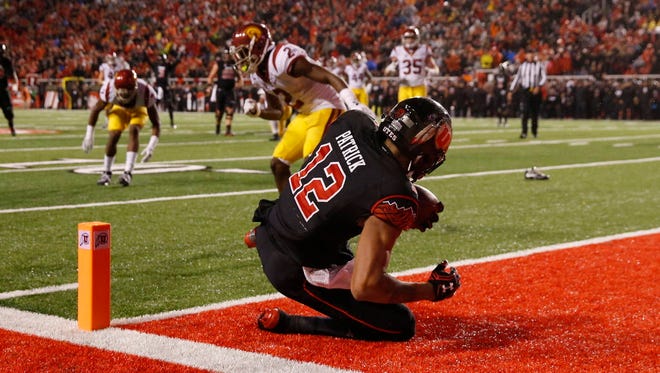 Utah wide receiver Tim Patrick (12) scores the game-winning touchdown against the USC Trojans.