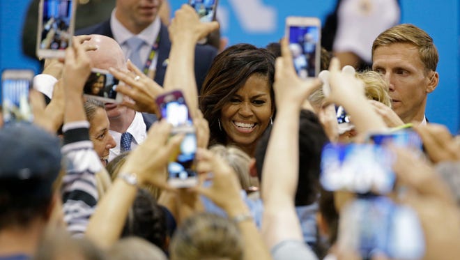 First lady Michelle Obama greets supporters after her address to the Arizona Democratic Party Early Vote rally at the Phoenix Convention Center on Thursday, Oct. 20, 2016 in Phoenix.